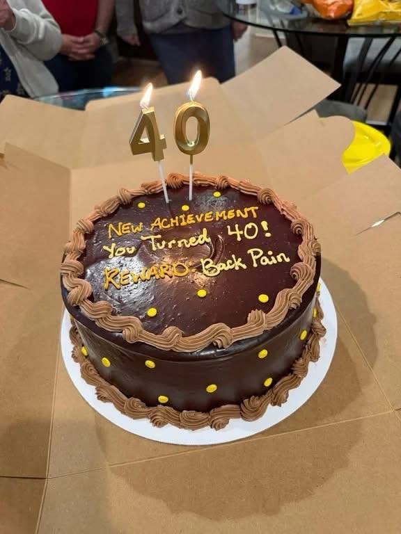 So apparently turning 40 comes with a mandatory 'back pain' reward.