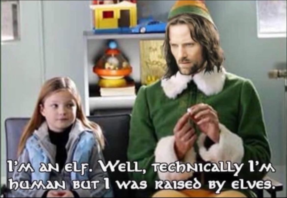 Aragorn from Lord of the Rings dressed as Buddy the Elf