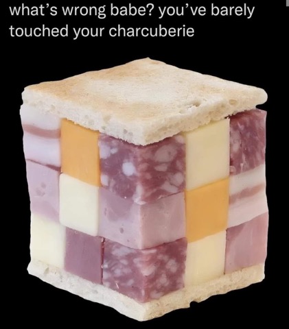 When your charcuterie board is so extra it looks like a Rubik's Cube