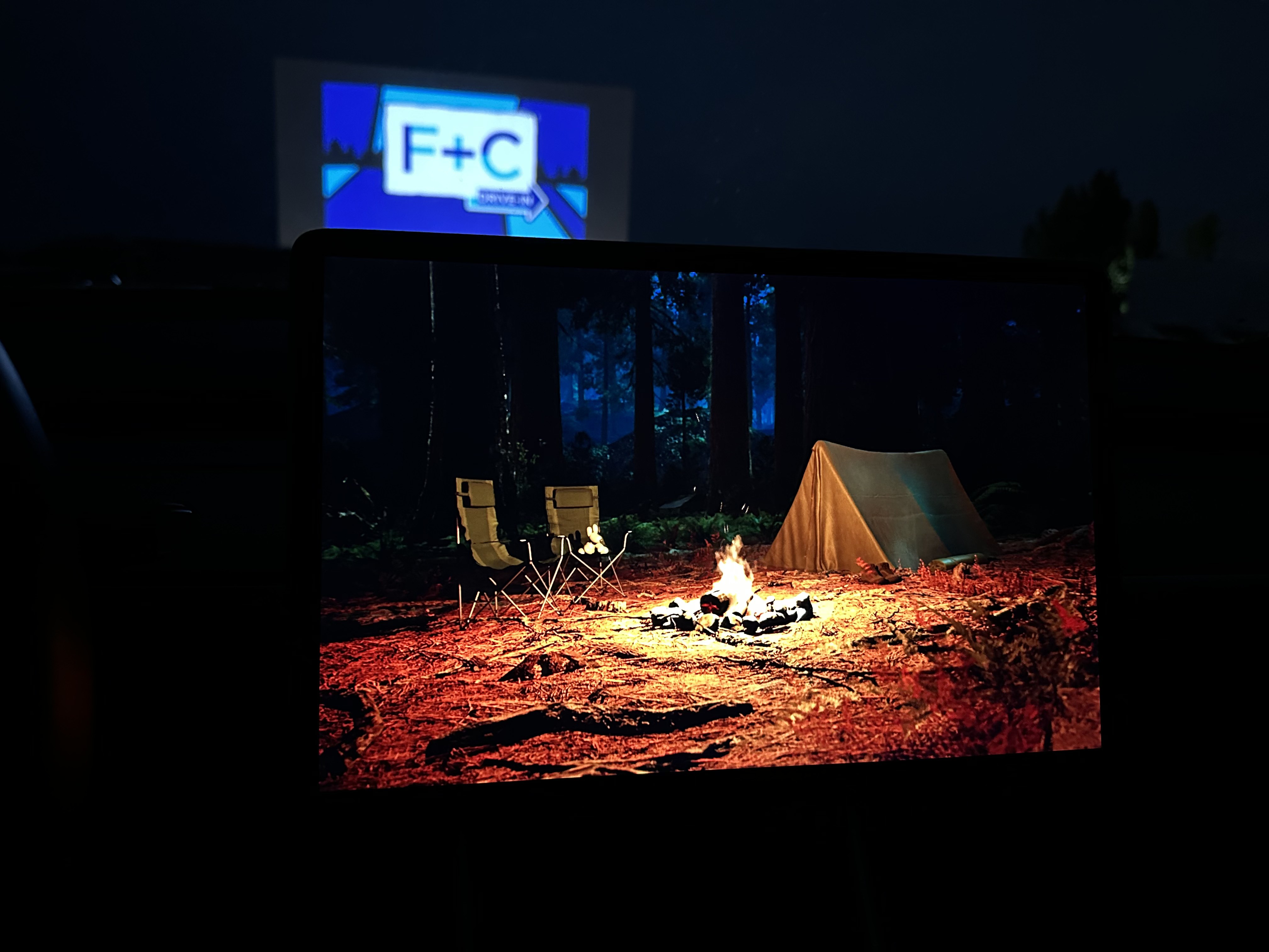 When you set up the perfect camping scene but realize the only thing you brought is a projector showing a fake campsite.