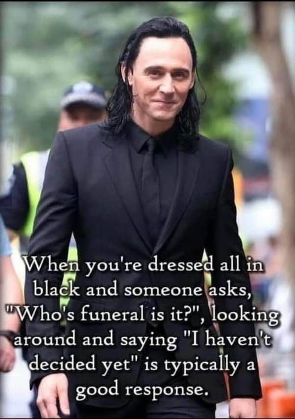 Loki serving looks and giving questionable life advice while dressed for a funeral.