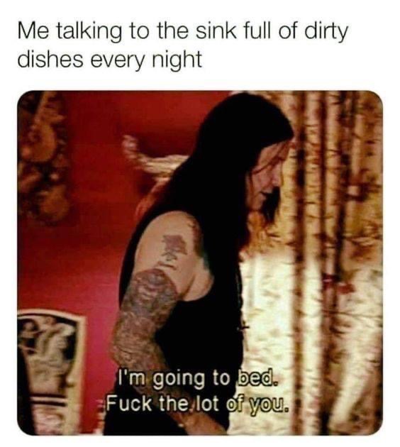 Me confronting my massive pile of dirty dishes before bed.