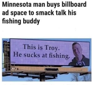 Bro went nuclear after losing to his fishing buddy by buying a whole billboard to roast him. Savage.