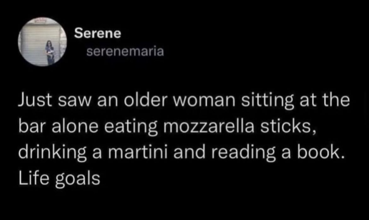 Mood: This woman living her best life with mozzarella sticks, a martini, and a good book.