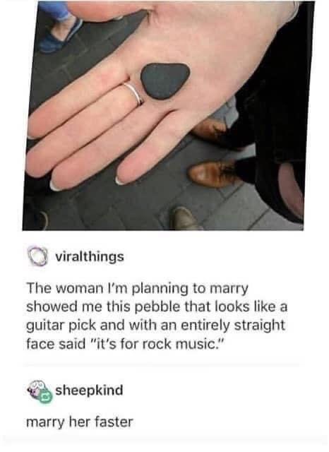 LMAO she presented a guitar pick shaped rock and said it's for rock music. Marry her.