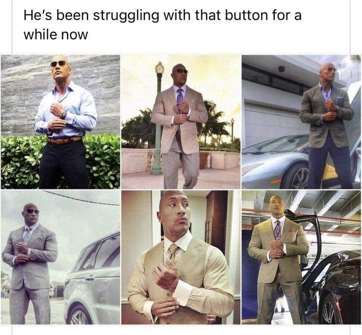 The Rock trying to do up his shirt buttons but it's not going great