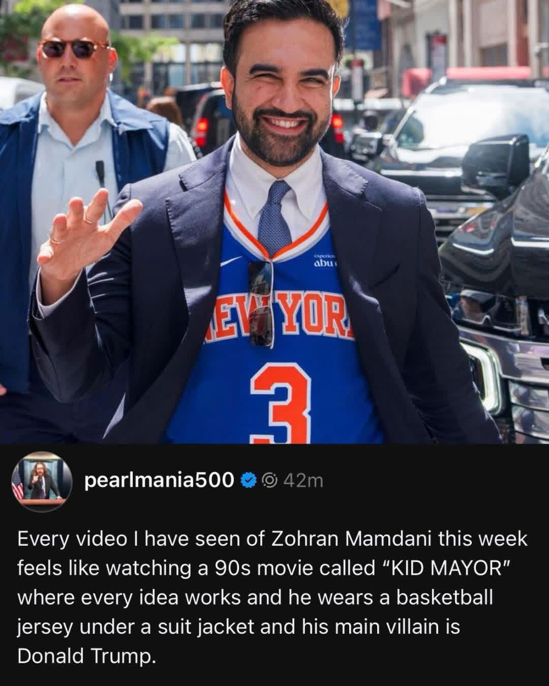 This dude is channeling his inner 90s movie protagonist with that jersey under a blazer look.