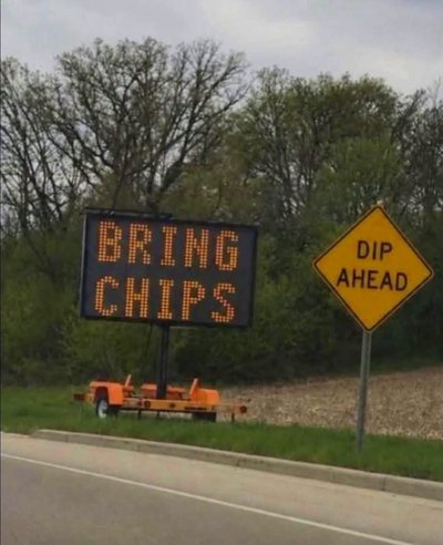 I thought this was a warning for a bumpy road, but it's actually an invitation to a snack party.