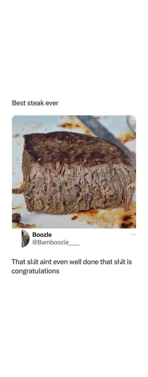 Me pretending to enjoy this extremely tough steak