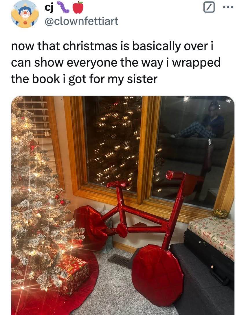 When you wrap a book for your sister and it ends up looking like a tiny red bicycle lol