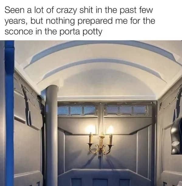 apparently some porta potties come with fancy chandeliers?? that's wild