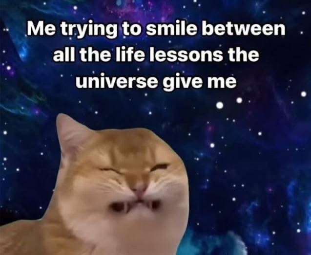 Me trying to smile through all the universe's wild lessons